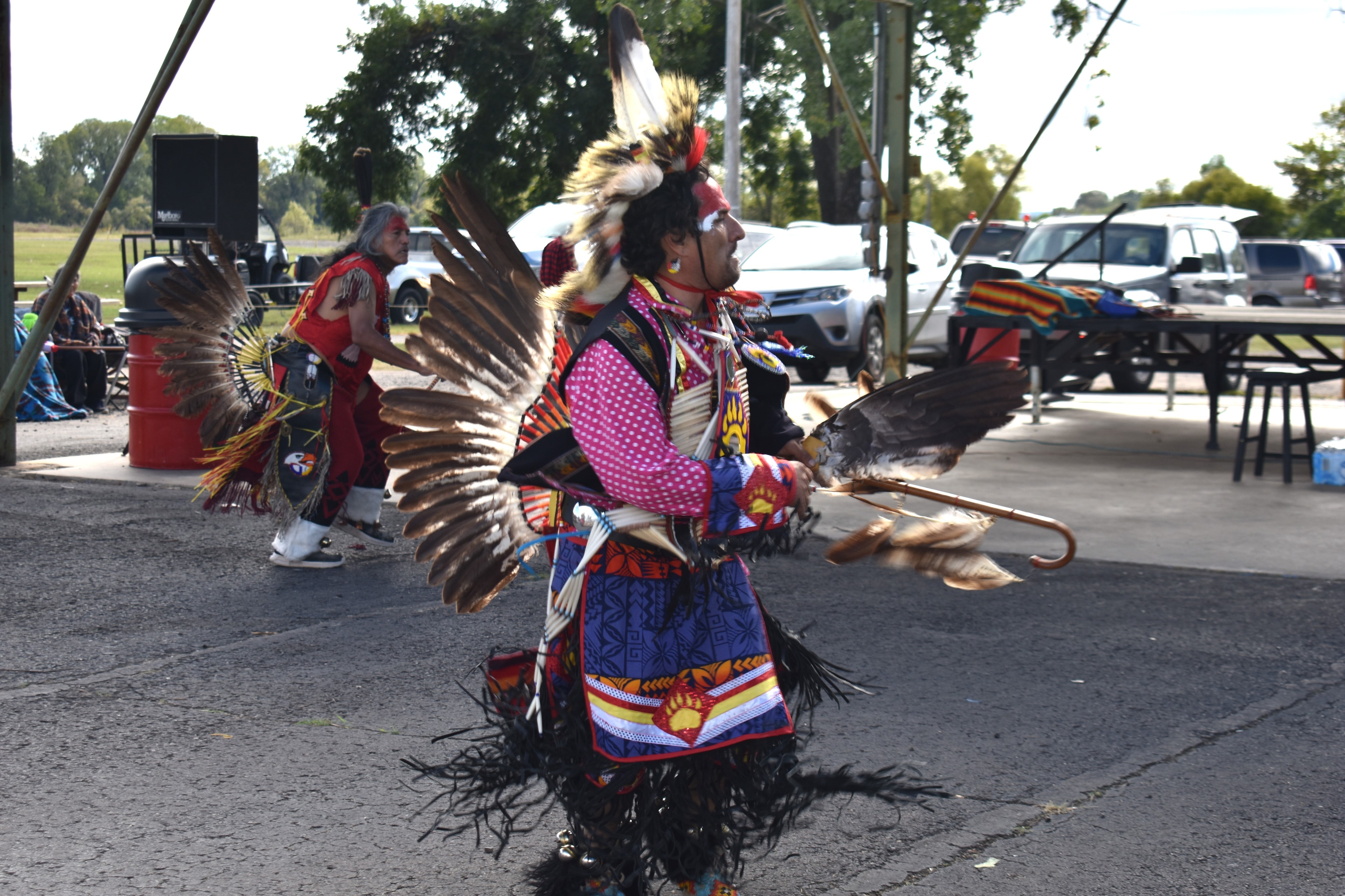 Cherokee dancer in full regalia performing at the Chickamauga Dance Festival