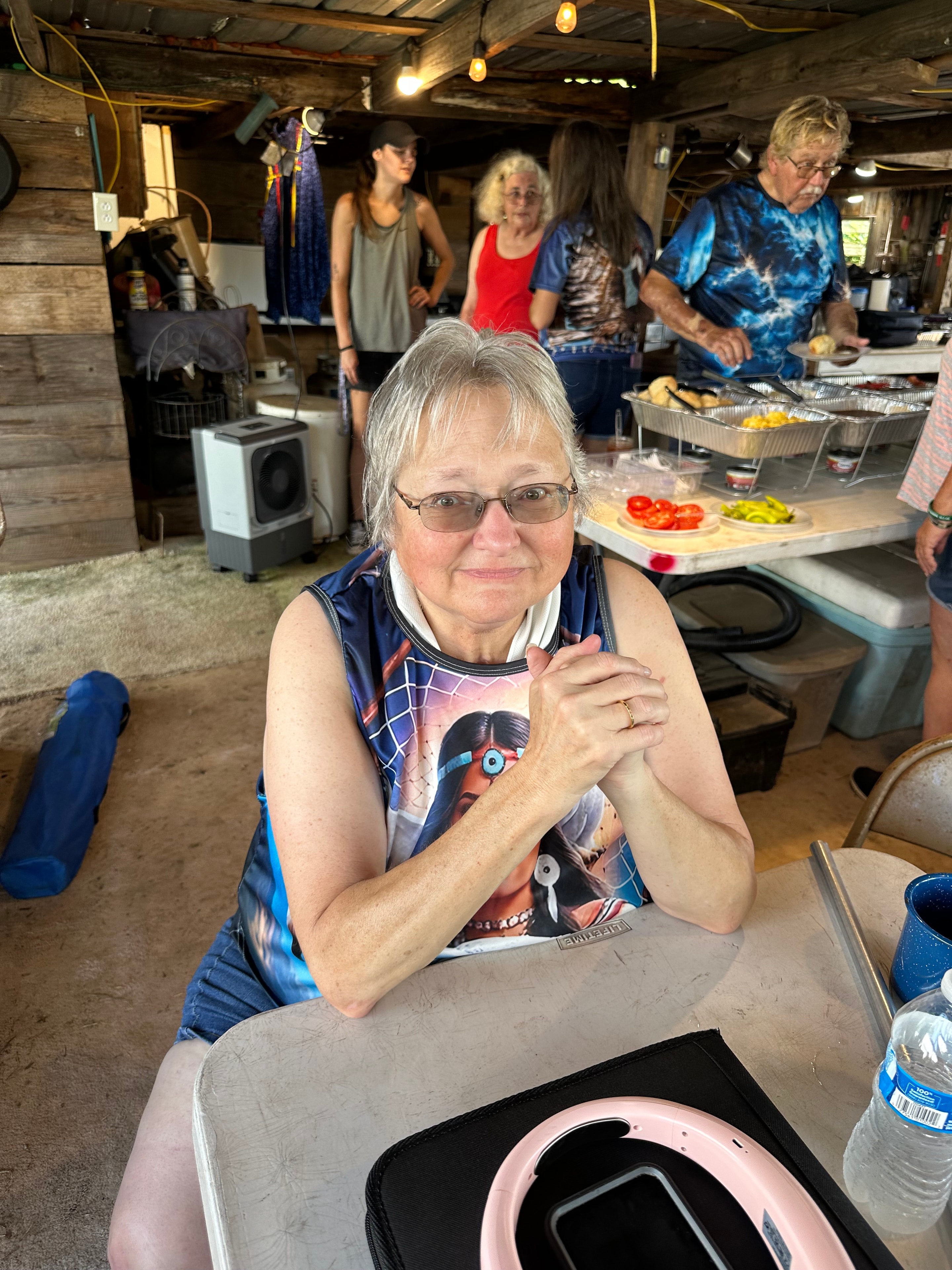 Tribal member wearing Native American themed shirt at Green Tree Ceremony July 11, 2026