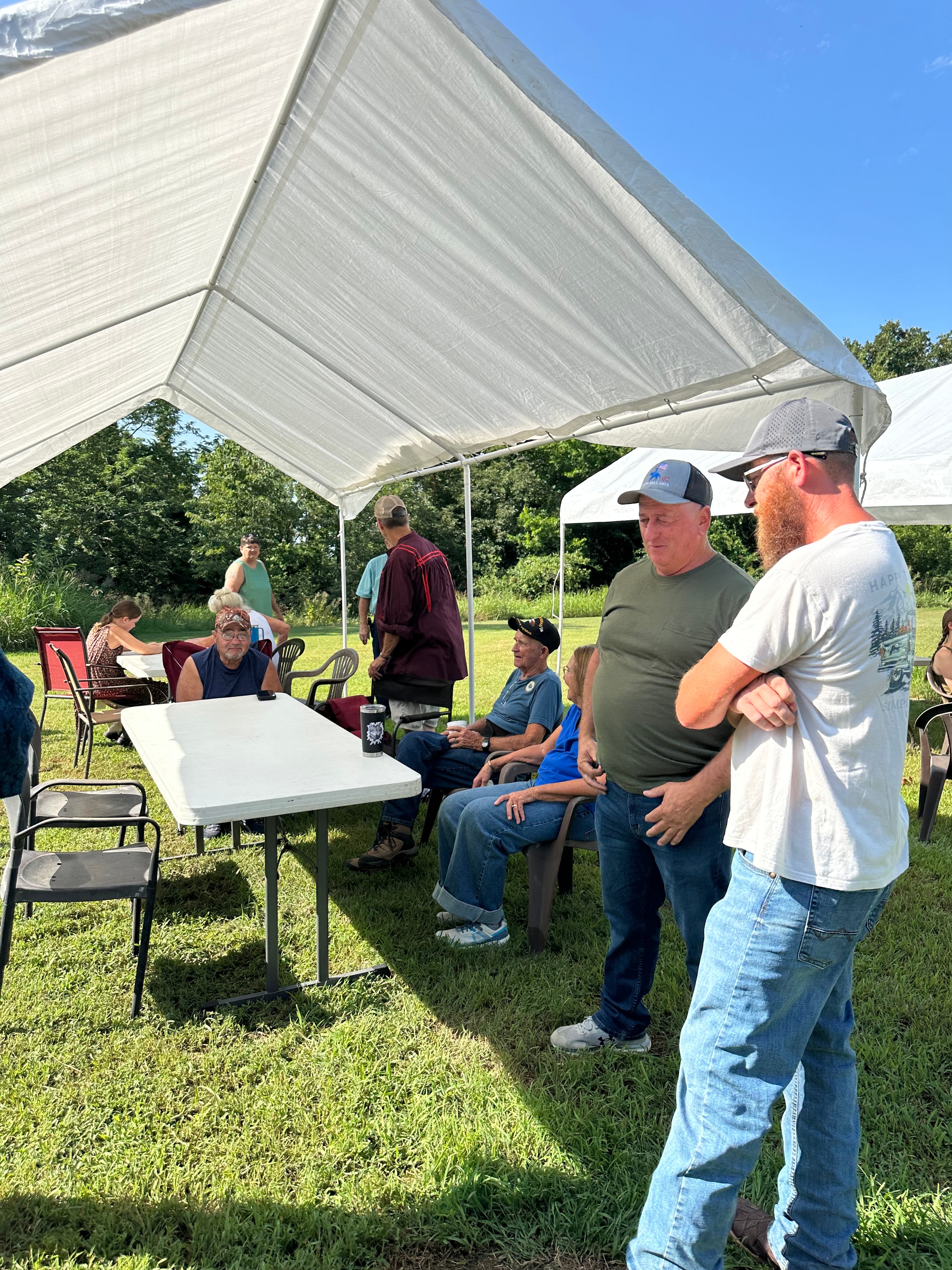 Tribal members gathered under the tent at Green Tree Ceremony July 11, 2026