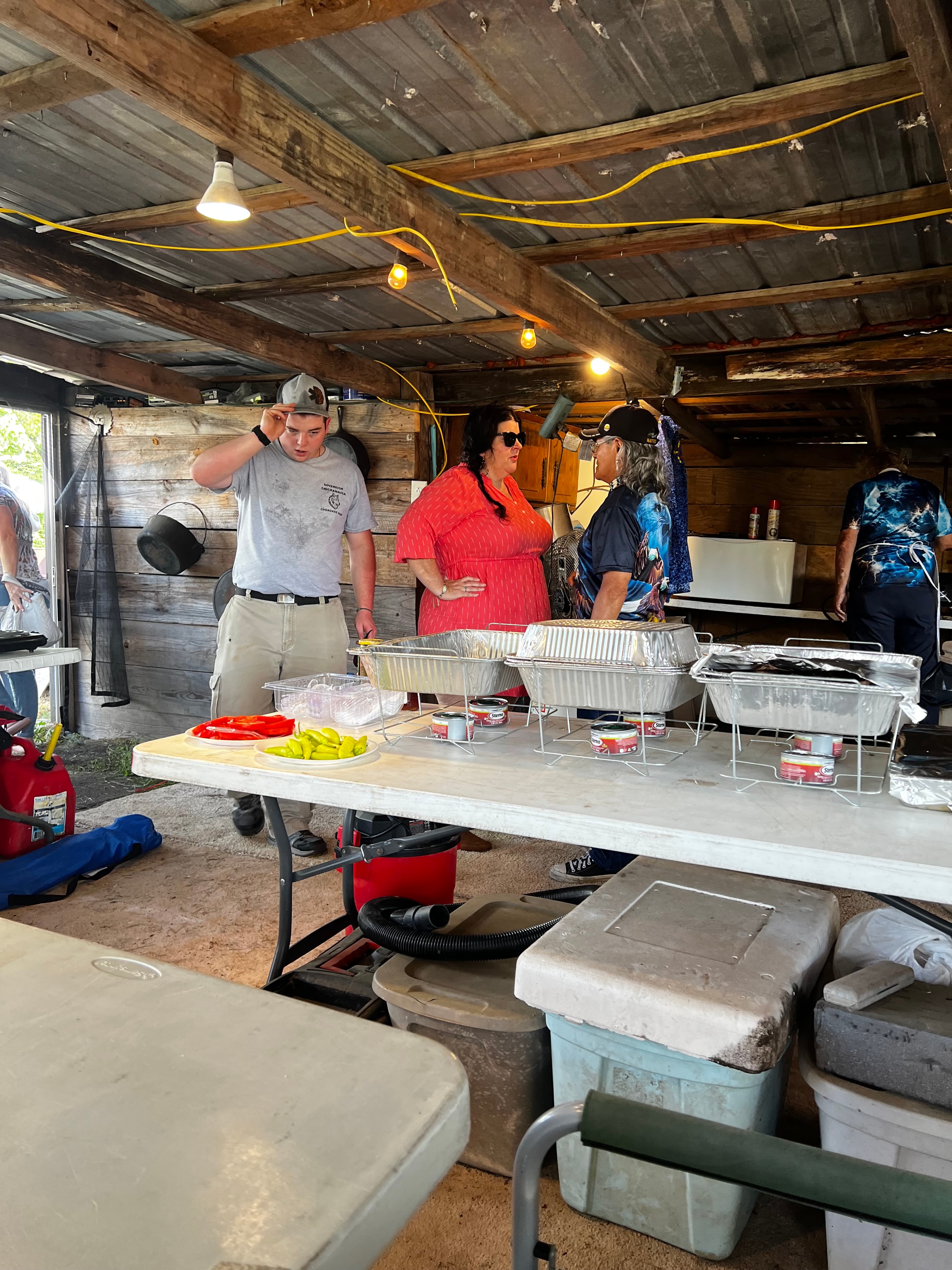 Tribal members preparing the feast inside the cook house at Green Tree Ceremony July 11, 2026