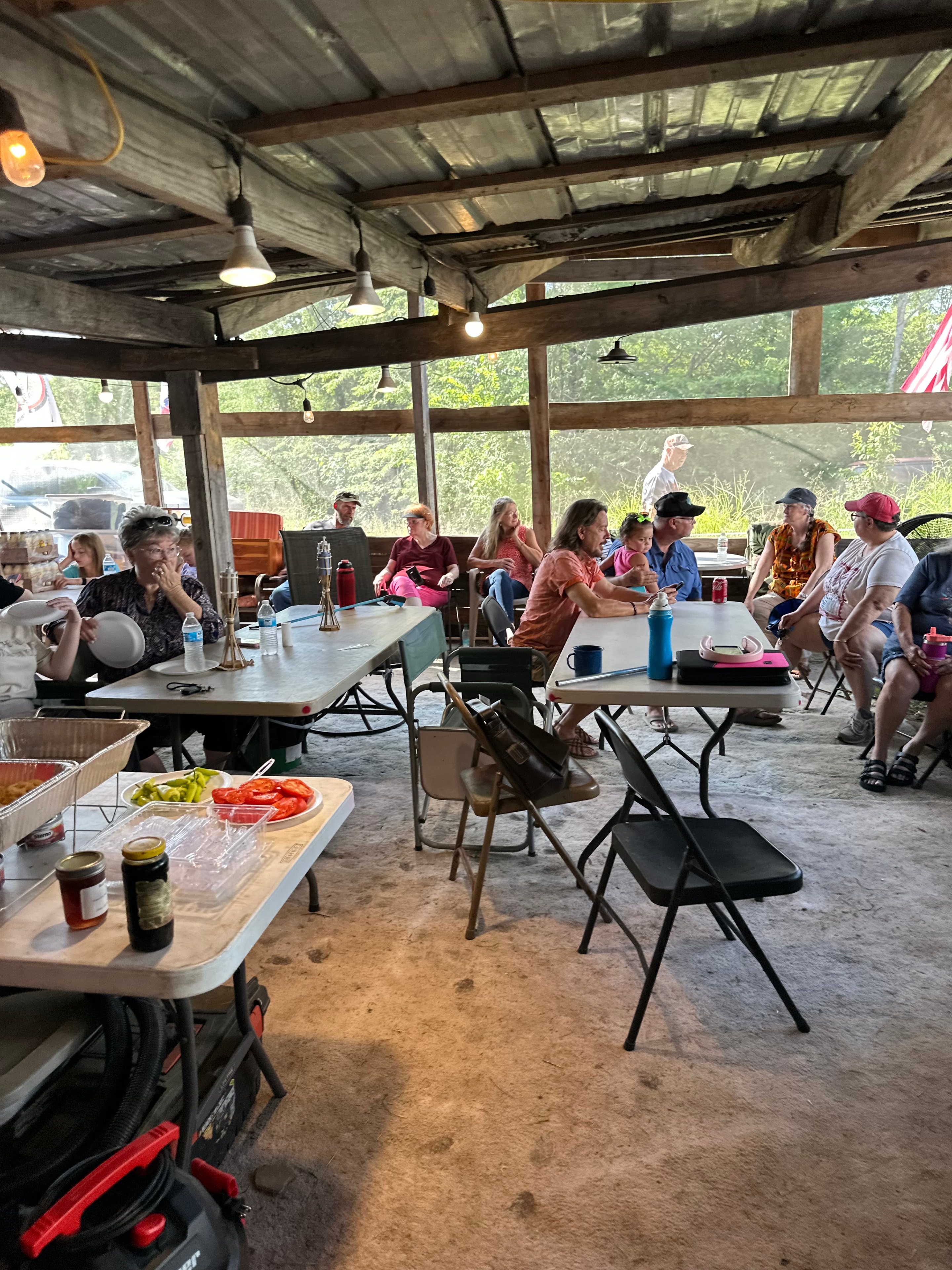 Tribal members sharing the feast inside the pavilion at Green Tree Ceremony July 11, 2026