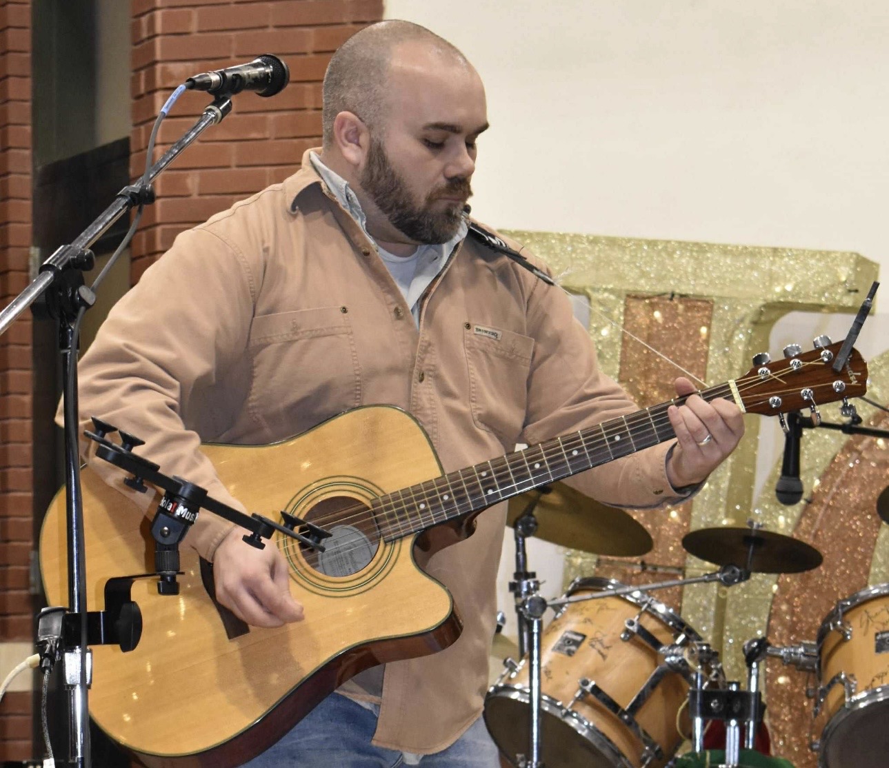Guitarist performing at Cherokee Chickamauga event