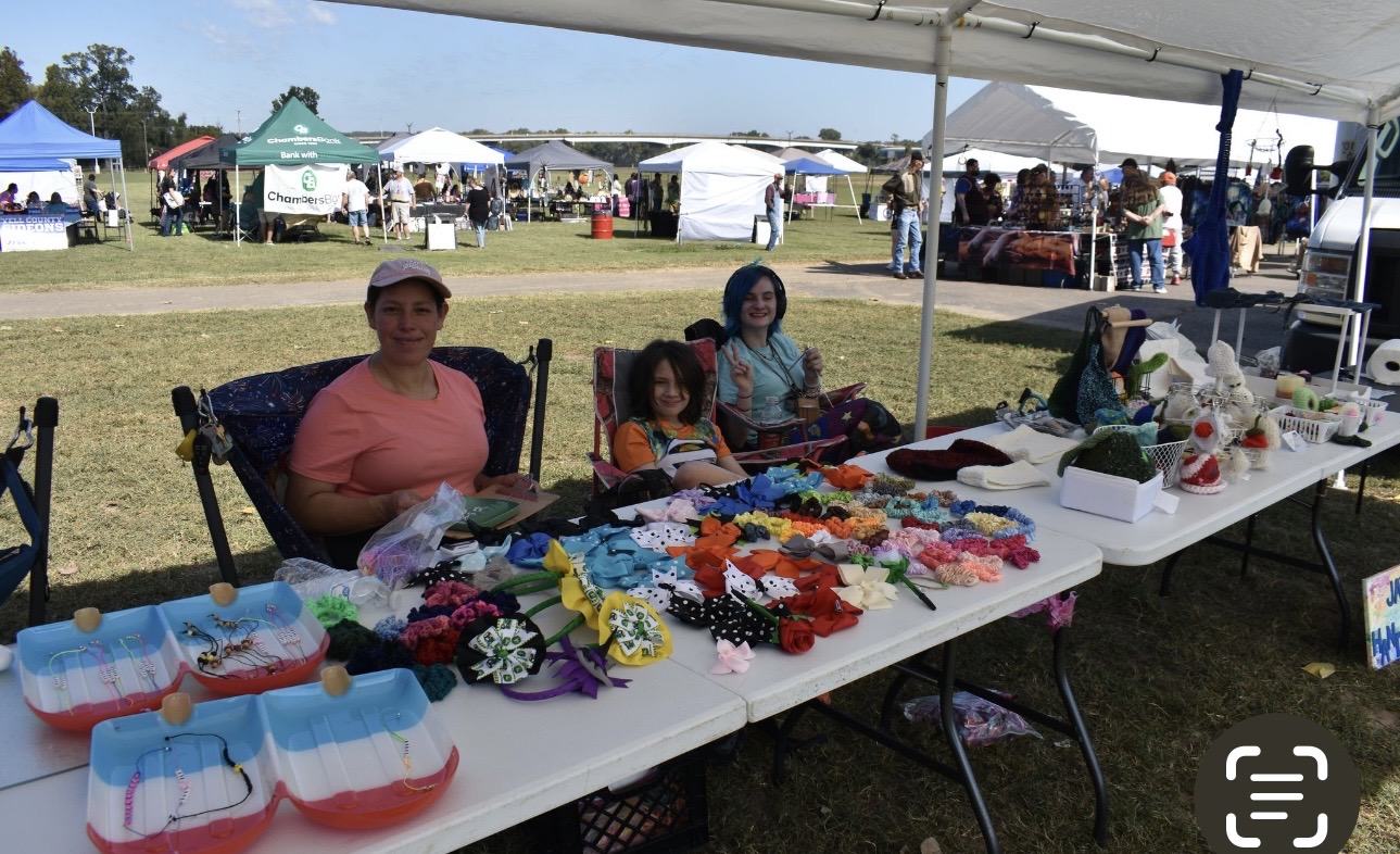 Hair bows and crafts vendor booth at Cherokee Chickamauga event
