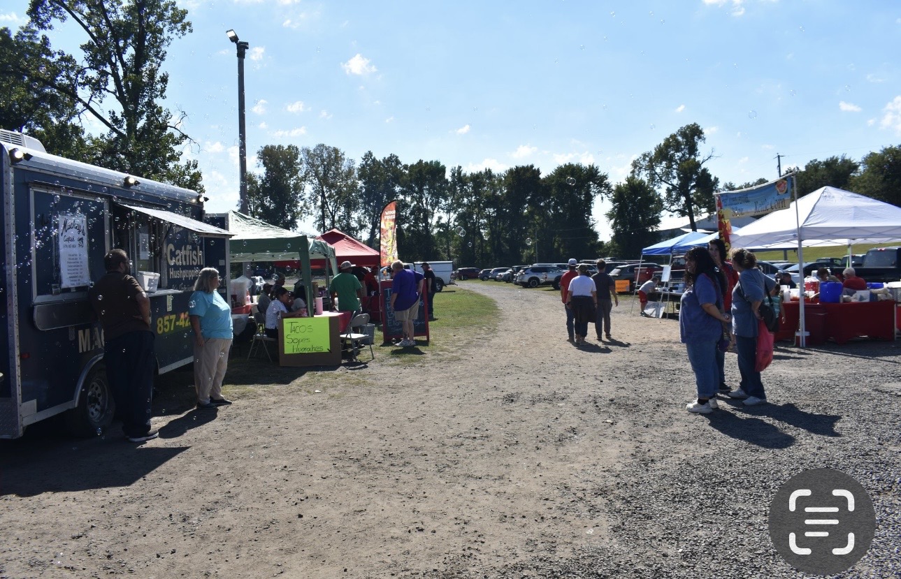 Community members browsing food and vendor booths at Cherokee Chickamauga gathering