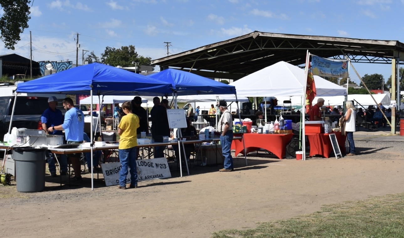 Vendor booths and community members at Cherokee gathering in Dardanelle, Arkansas