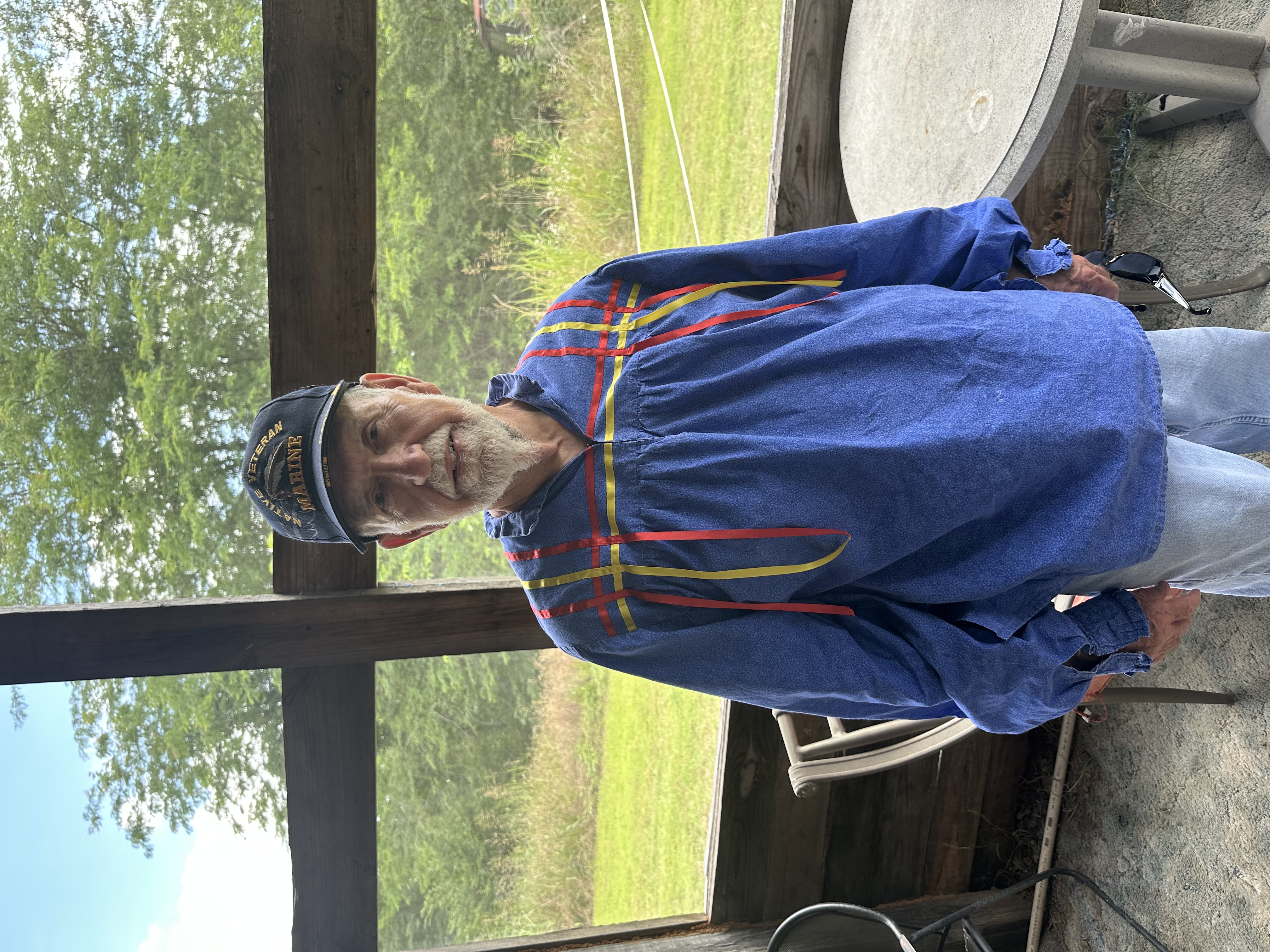 Tribal member in Cherokee ribbon shirt at Green Corn Ceremony 2026