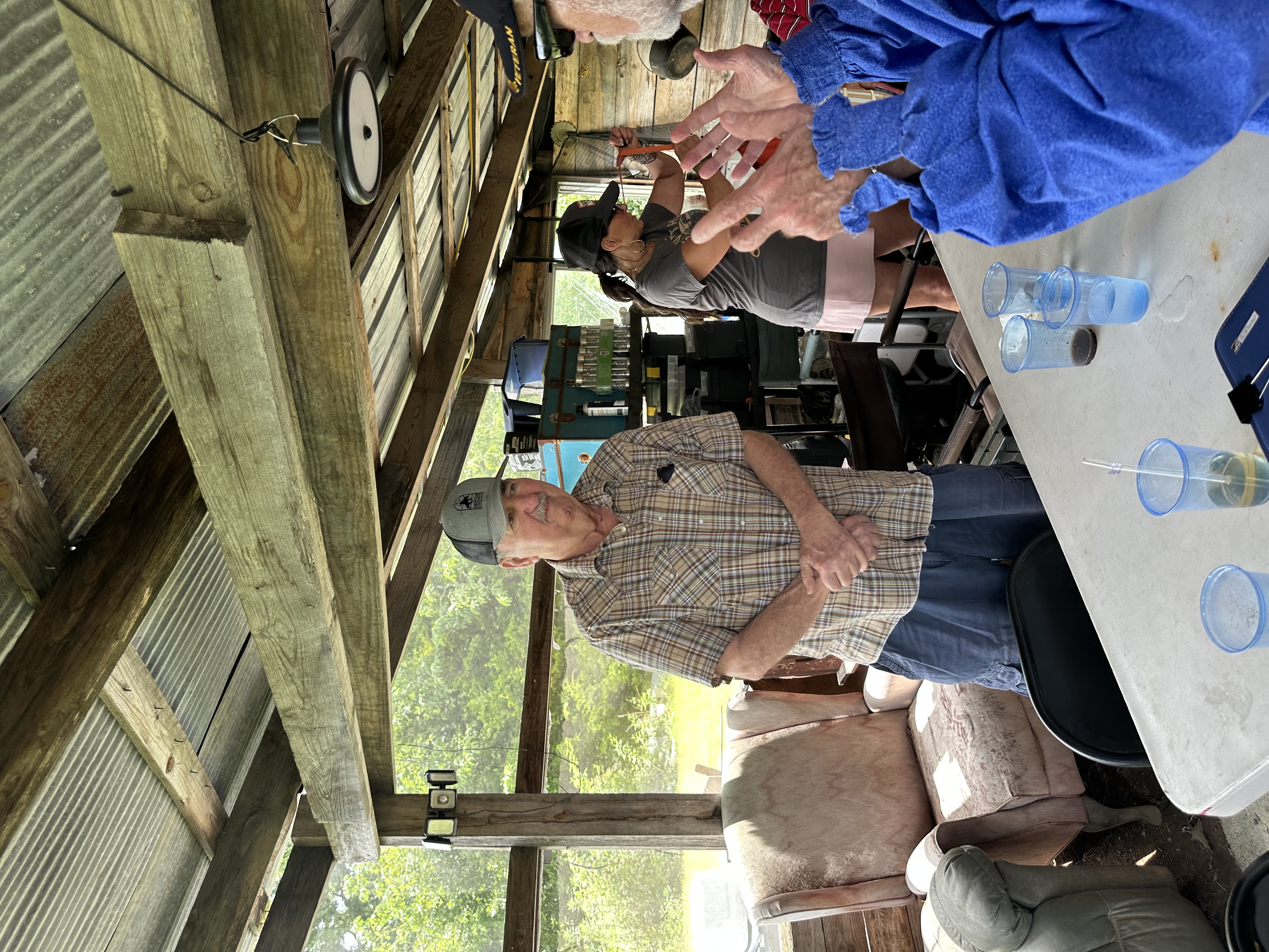 Tribal members in conversation at Green Corn Ceremony 2026