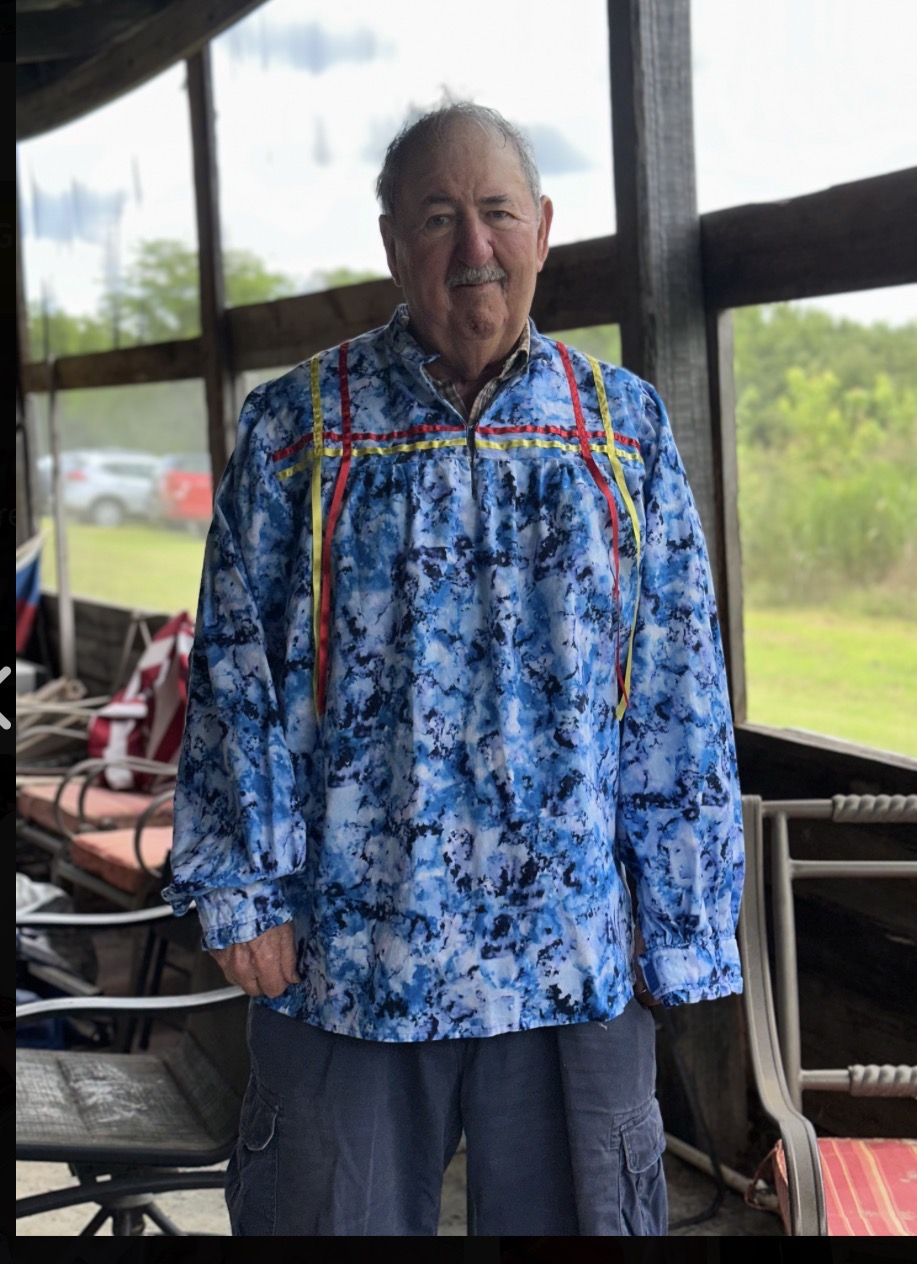 Cherokee tribal elder in traditional ribbon shirt at Green Corn Ceremony 2026