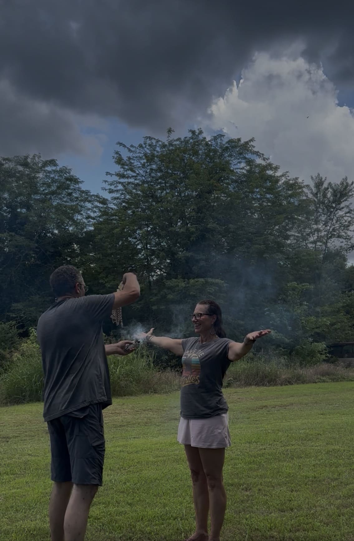 Tribal member being smudged with sacred smoke at Green Corn Ceremony 2026