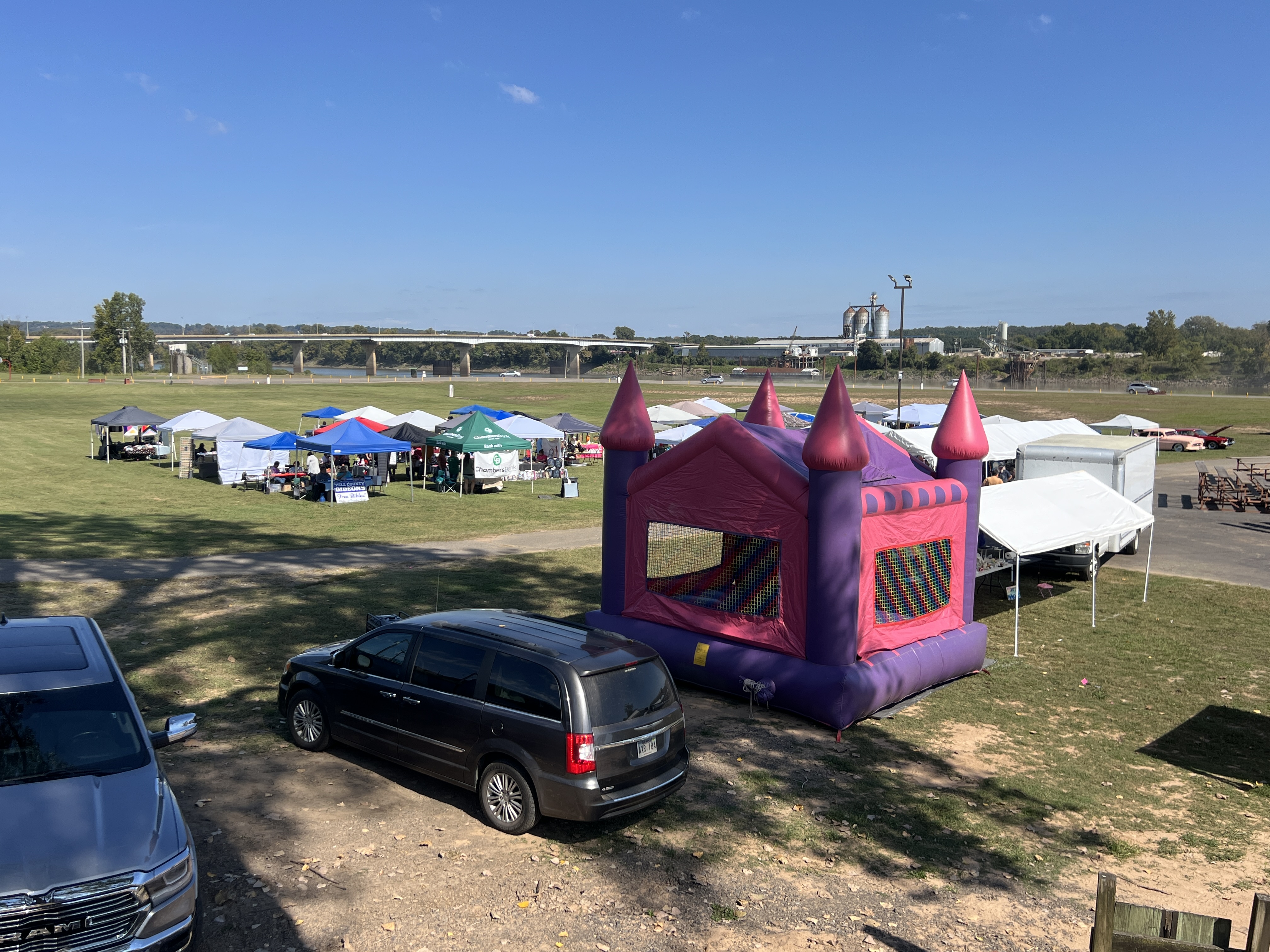 Aerial view of vendor tents and bounce house at October Festival 2025 along the Arkansas River