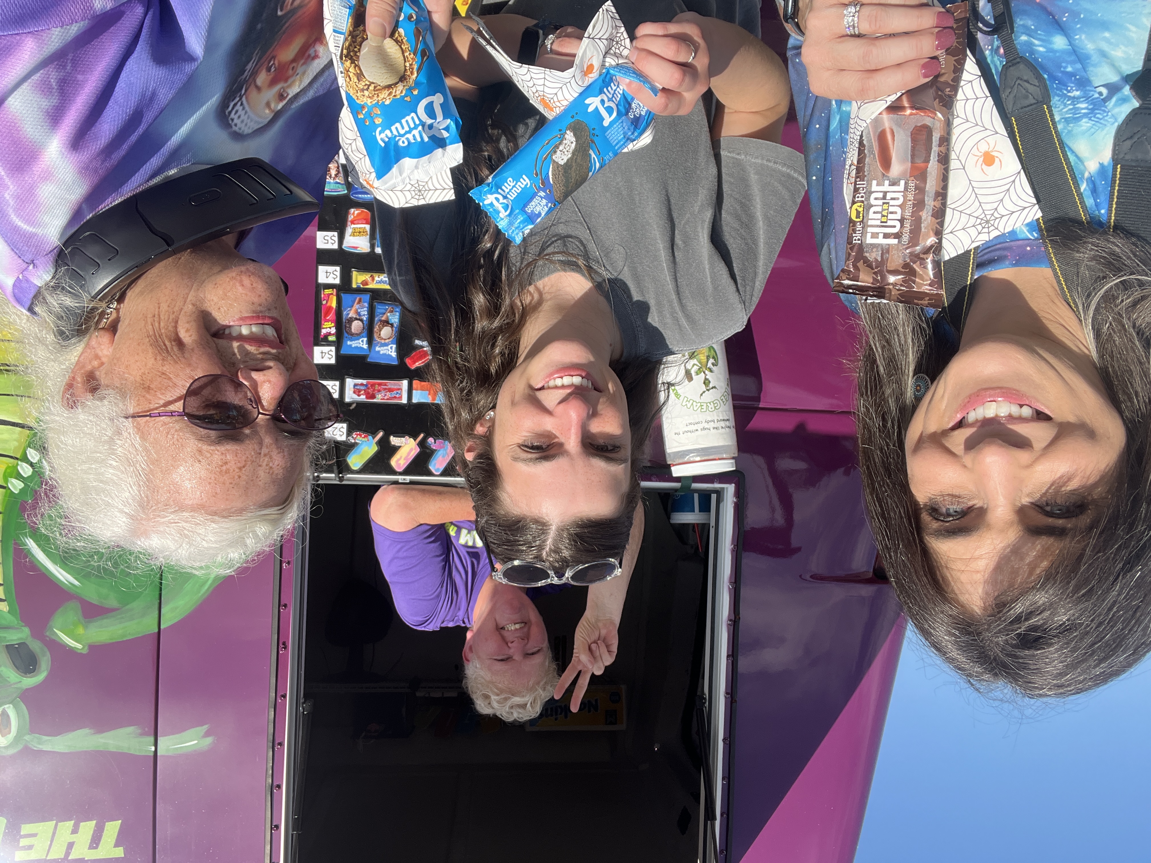 Community members smiling at the ice cream truck at October Festival 2025